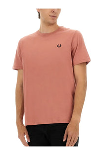 Fred Perry men’s soft rose-colored cotton t-shirt with small black embroidered laurel wreath logo on left chest