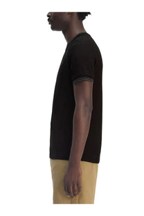 Fred Perry men’s black short-sleeved cotton t-shirt with subtle striped trim on sleeves and neckline