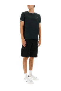 Black fred perry t-shirt with white trim and small chest logo in a fred perry mens double stripe shirt green style