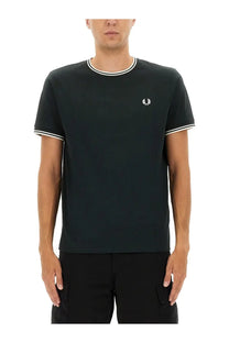 Black fred perry t-shirt with white collar and cuff trim and small embroidered logo on the chest