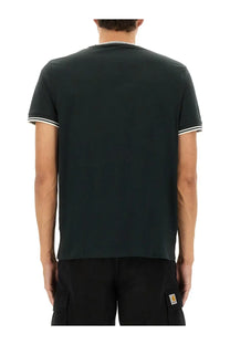 Fred Perry men’s dark green short-sleeved t-shirt with white trim on collar and sleeve cuffs for casual wear