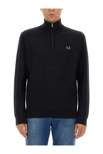 Fred Perry men’s black half-zip sweater with gold embroidered laurel wreath logo on chest in jersey blue style