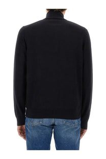 Fred Perry men’s black turtleneck sweater with smooth fitted silhouette and ribbed cuffs in jersey material