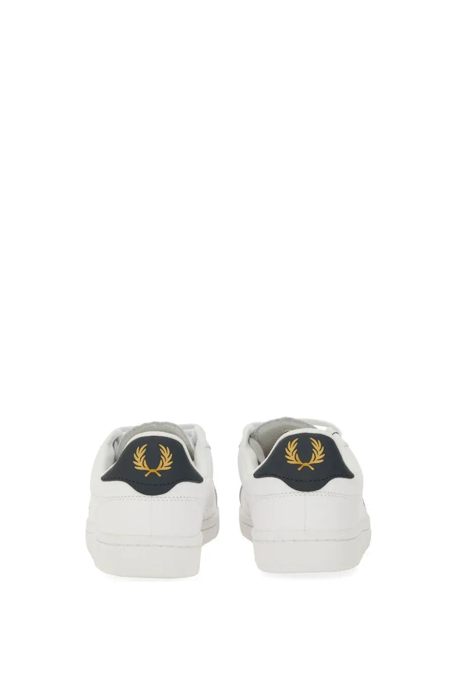 Fred Perry men’s white leather sneakers with black heel tab and gold laurel wreath logo shown from the back side