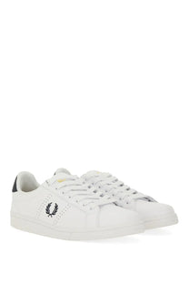 Fred Perry men’s white leather sneakers with black embroidered laurel wreath logo and perforated detailing