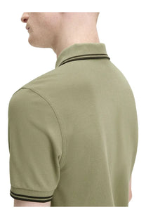 Fred Perry men’s olive green polo shirt with black trim on collar and sleeve cuffs for casual wear