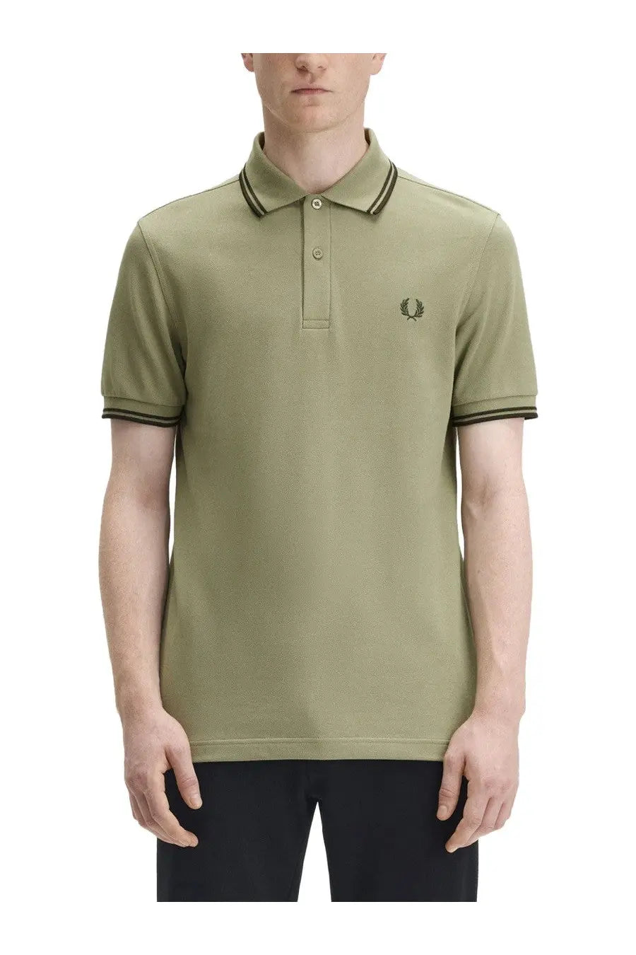 Fred Perry men’s green polo shirt with black trimmed collar sleeves and embroidered laurel wreath logo on the chest