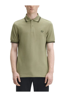 Fred Perry men’s green polo shirt with black trimmed collar sleeves and embroidered laurel wreath logo on the chest