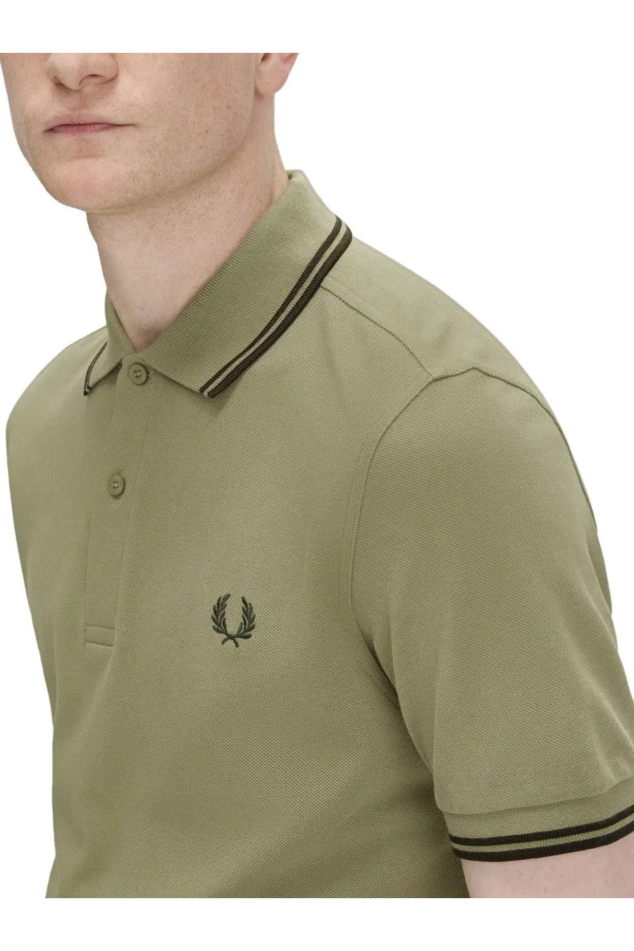 Fred Perry men’s olive green pique polo shirt with black and white striped collar and embroidered laurel wreath logo