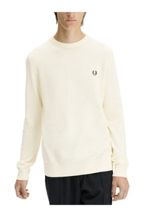 Fred Perry men’s cream-colored long-sleeved crewneck sweater with black embroidered laurel wreath logo on chest