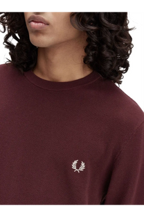 Fred Perry men’s red textured knit crewneck sweater with white embroidered laurel wreath logo on left chest