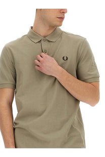 Fred Perry men’s beige polo shirt with classic collar button placket and embroidered logo on left chest