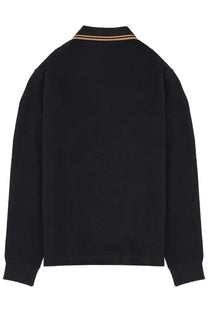 Fred Perry men’s black long-sleeved polo shirt with collar featuring two thin tan stripes in cotton material