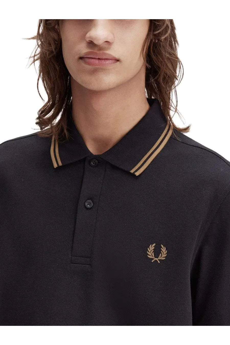 Fred Perry men’s black polo shirt with gold-trimmed collar and embroidered laurel wreath logo