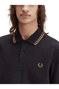 Fred Perry men’s black polo shirt with gold-trimmed collar and embroidered laurel wreath logo