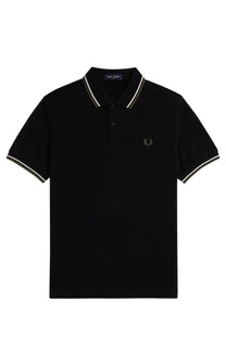 Fred Perry men’s black polo shirt with white trim collar and sleeves featuring embroidered laurel wreath logo