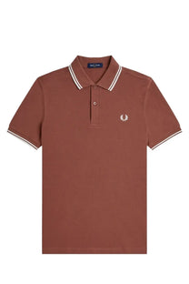 Fred Perry men’s polo brown rust colored with white trim and embroidered laurel wreath logo on chest