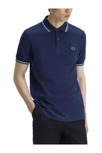Fred Perry men’s navy blue polo shirt with white and teal trim and small embroidered chest logo