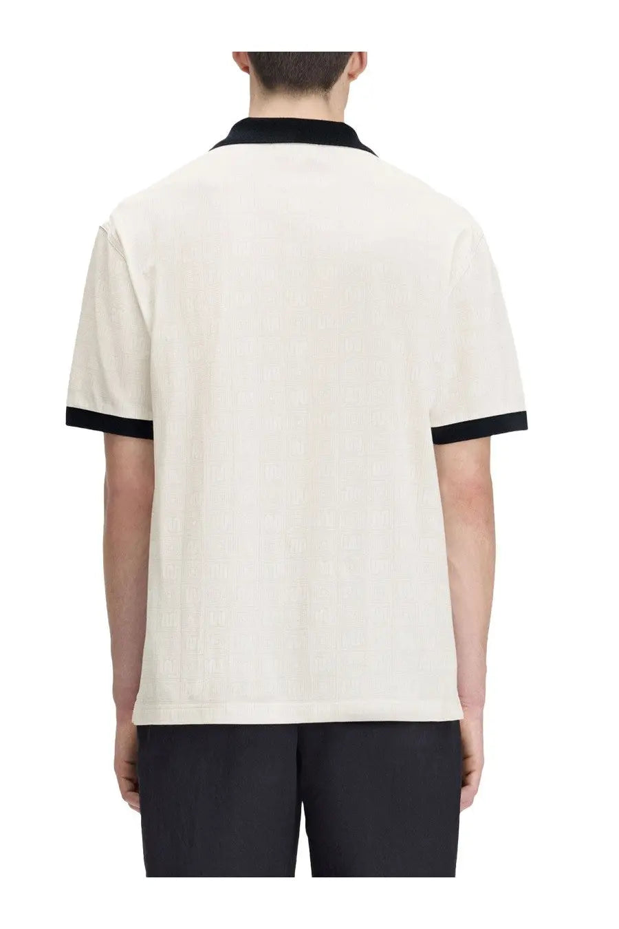 Fred Perry men’s cream-colored polo shirt with short sleeves and black ribbed collar and cuffs in cotton blend
