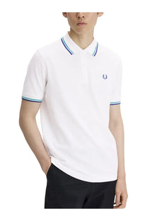 Fred Perry men’s white polo shirt with navy and light blue striped trim and embroidered laurel wreath logo on chest