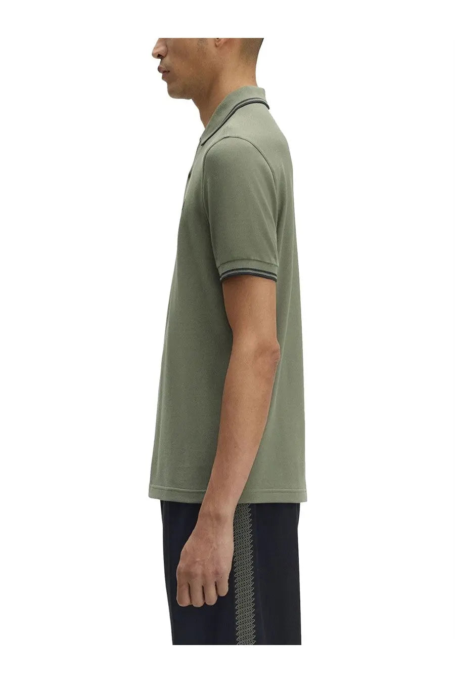 Fred Perry men’s slim-fit olive green polo shirt with black trim on collar and sleeve cuffs