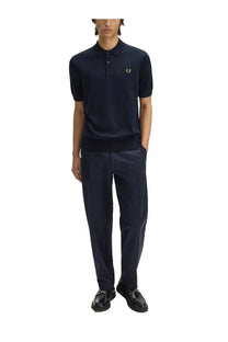 Navy blue Fred Perry men’s cotton polo shirt with gold embroidered logo on chest for casual wear