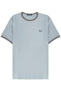 Light blue Fred Perry men’s short-sleeved t-shirt with classic round neckline and navy red white ribbed trim