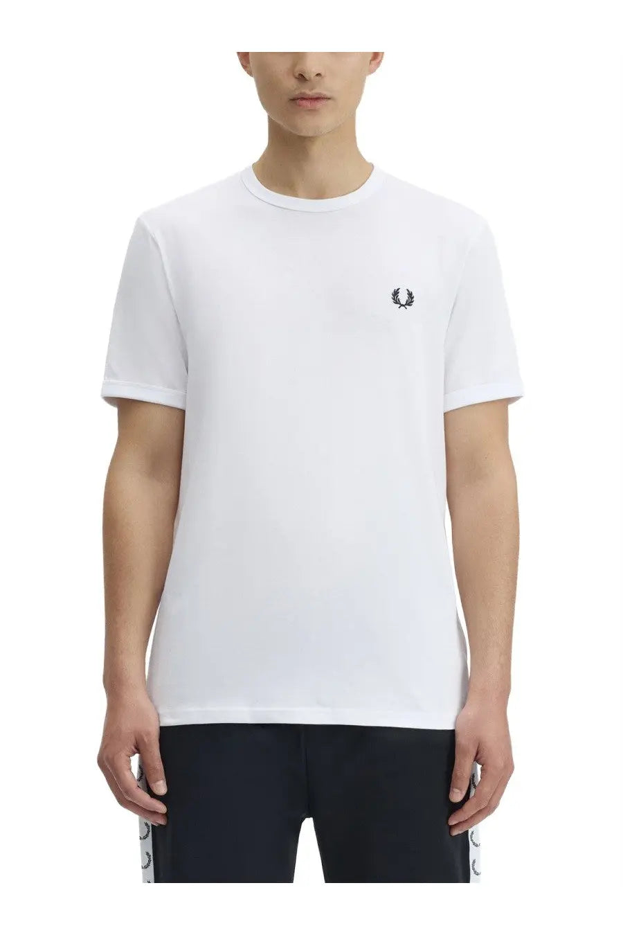 Fred Perry men’s white t shirt with black embroidered laurel wreath logo on the left chest in cotton material