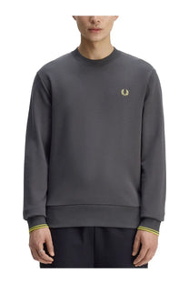 Fred Perry men’s dark gray crewneck sweatshirt with gold laurel wreath logo and yellow trim on cuffs