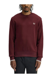 Fred Perry men’s maroon sweatshirt with white embroidered laurel wreath logo and white stripe cuffs