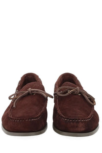 Brown suede moccasin loafers with matching laces and stitched detailing by G.H. Bass men’s mocassino camp moc