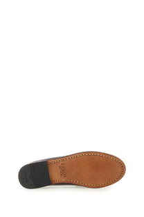 Brown leather sole with visible stitching and black rubber heel of gh bass women’s mocassino weejun penny red