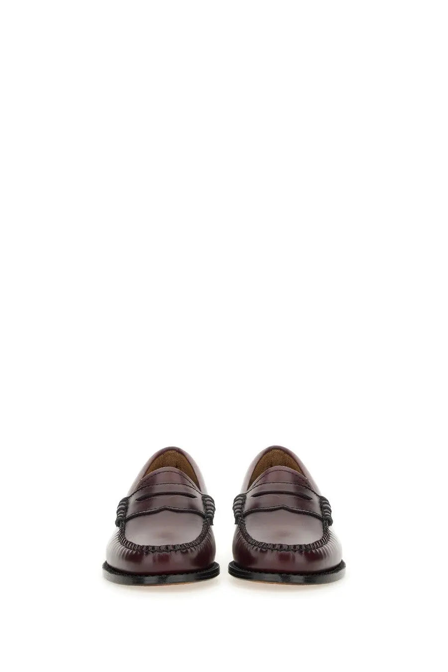 G.H. Bass women’s mocassino weejun penny loafers in burgundy leather with black stitched detailing and slip-on design