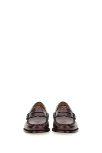 G.H. Bass women’s mocassino weejun penny loafers in burgundy leather with black stitched detailing and slip-on design
