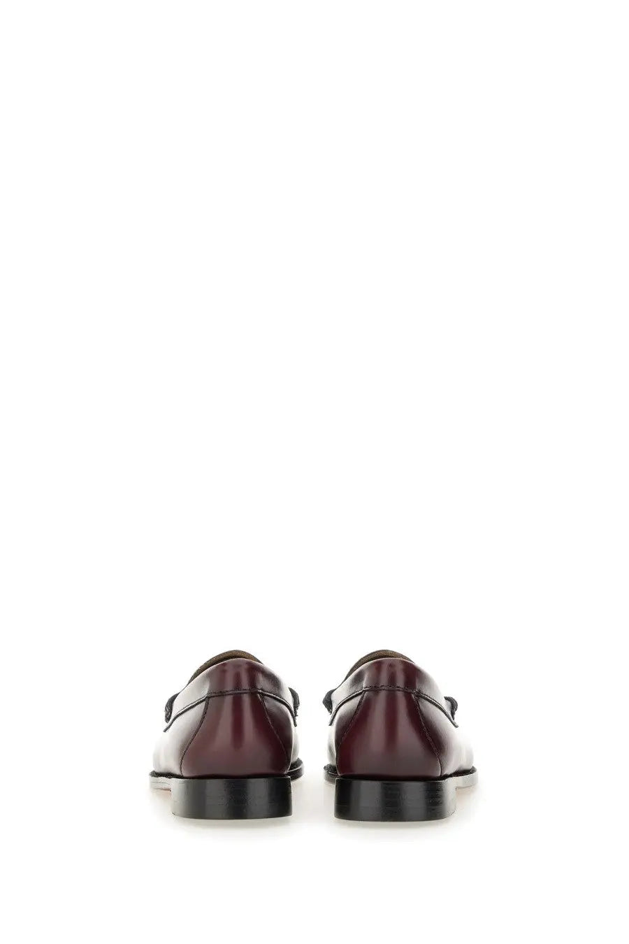 G.H. Bass women’s mocassino weejun penny red burgundy leather loafers with black rubber soles and classic moccasin design