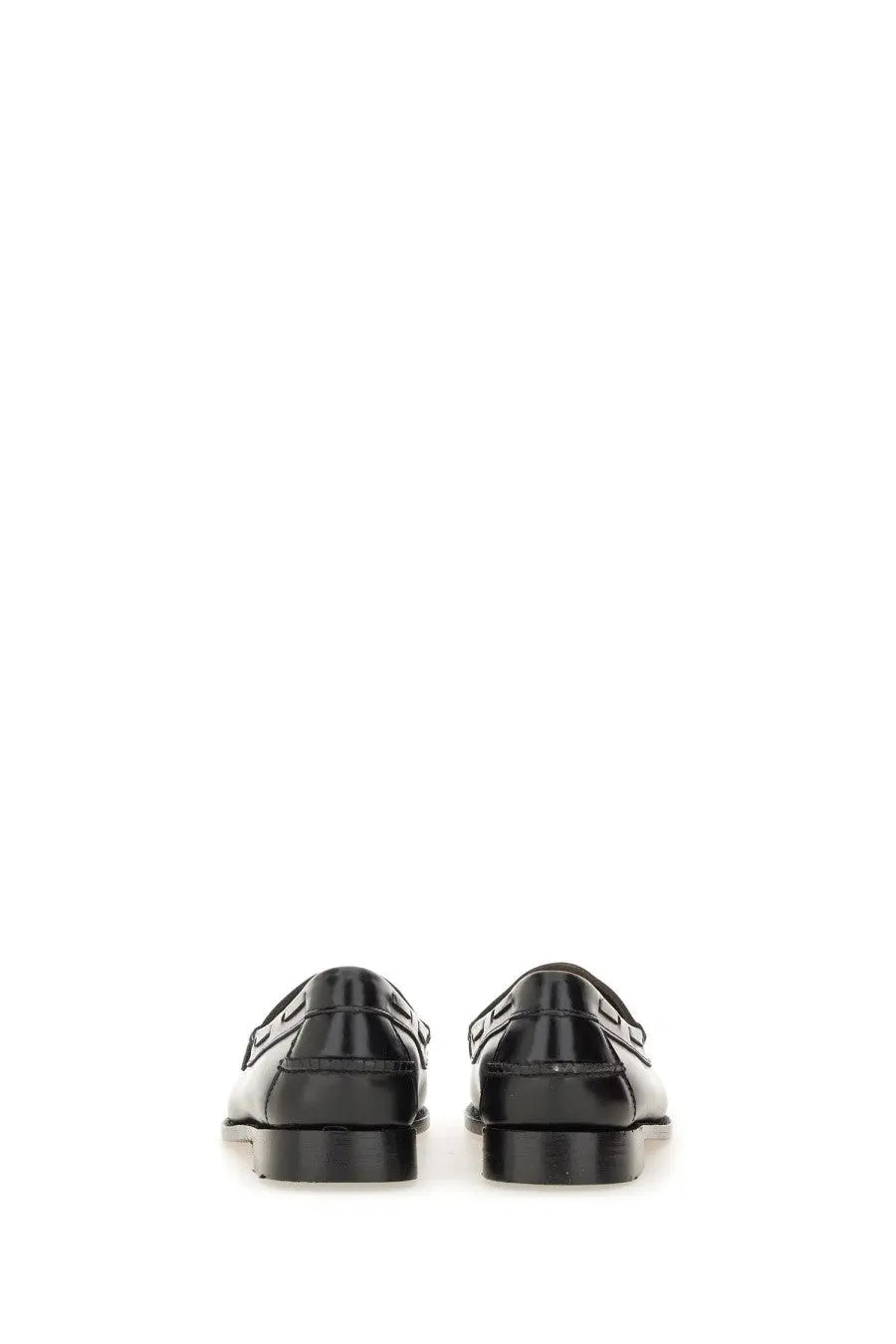 Black patent leather loafers with glossy finish and distinctive logo detailing on the back by G.H. Bass women’s Moccasin Weejuns Esther Kiltie black