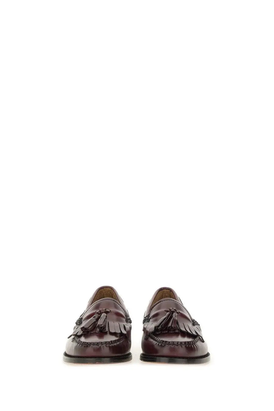 Dark brown leather loafers with decorative tassels and stitched detailing from gh bass women’s moccasin weejuns esther kiltie red
