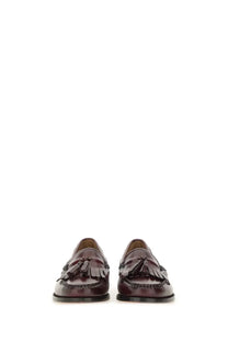 Dark brown leather loafers with decorative tassels and stitched detailing from gh bass women’s moccasin weejuns esther kiltie red