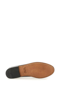 Tan leather sole with black rubber heel and stitched edges of gh bass women’s moccasin weejuns tricolour penny multicolor
