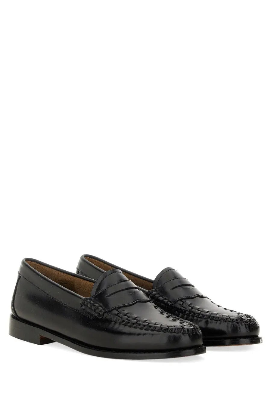 G.H. BASS women’s black leather penny loafers with polished finish and braided detailing along the toe