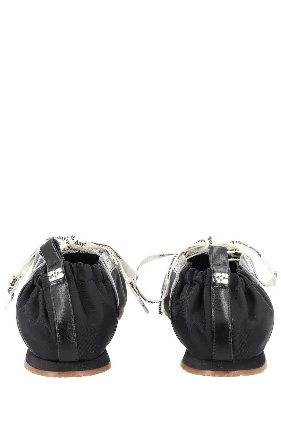 Ganni women’s ballerina sporty black leather flats with white printed ribbon laces and metallic logo on back view