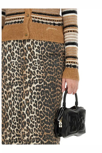 Black quilted leather mini handbag with embossed logo and top handle paired with ganni women’s beige cardigan