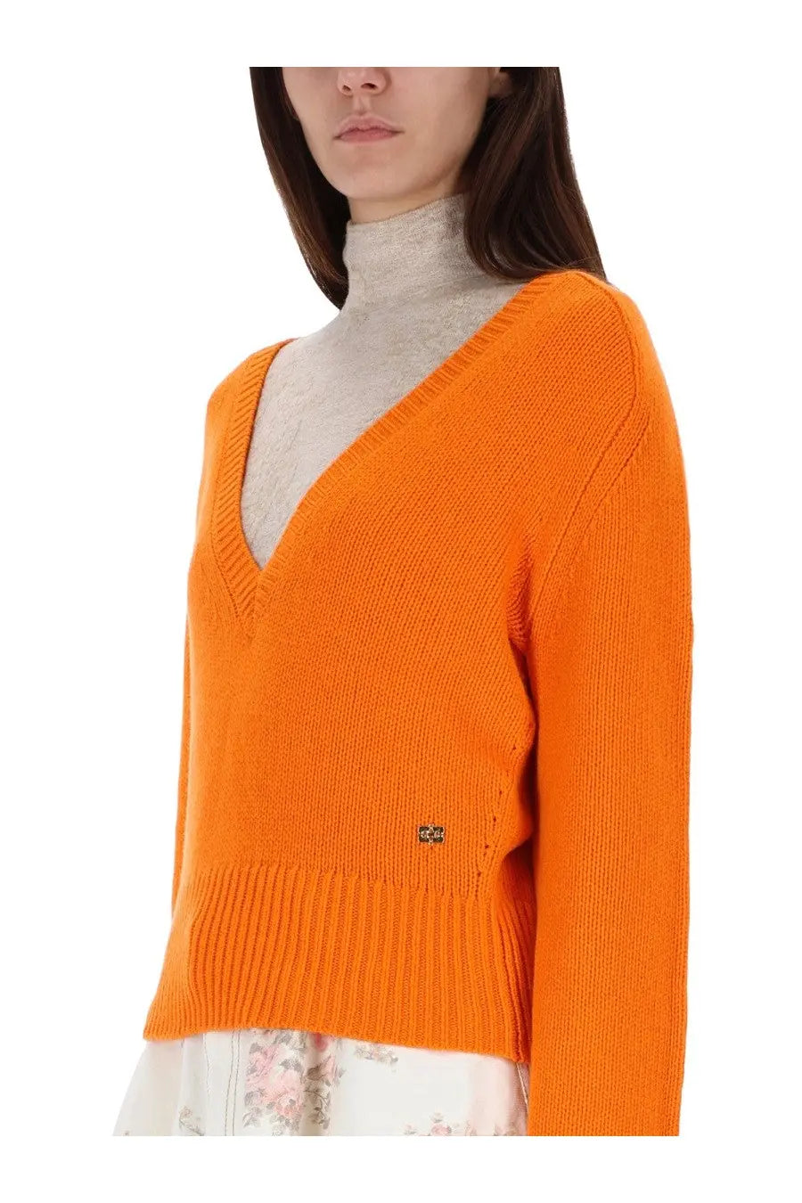 Ganni women’s cashmere sweater orange with v-neckline ribbed hem and small embroidered logo on lower left side