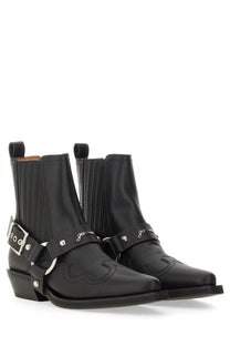 Black leather ganni women’s chelsea western fitted boots with silver buckle straps and embossed logo detailing