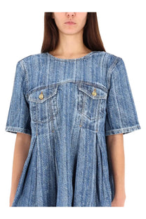 Ganni women’s blue denim dress with short sleeves two front pockets and gold tone buttons