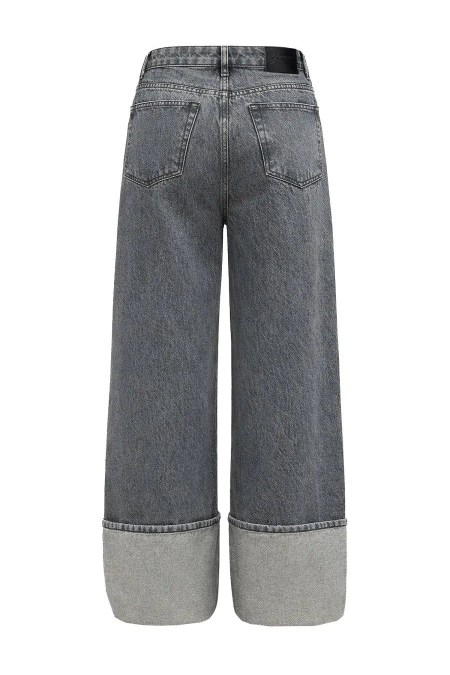 Ganni women’s wide-leg double fly jeans in faded gray denim with rolled cuffs and black brand label at waistband