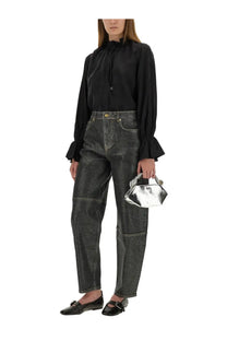 Silver geometric handbag with shiny metallic finish and structured angular design paired with ganni women’s fluid cupro shirt black