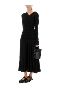 Ganni women’s gathered midi dress in black with ruched long sleeves and flowing skirt paired with black studded flats