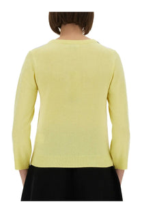 A pale yellow long-sleeved knit sweater with ribbed hem and cuffs in ganni women’s jacquard cashmere cardigan multicolor