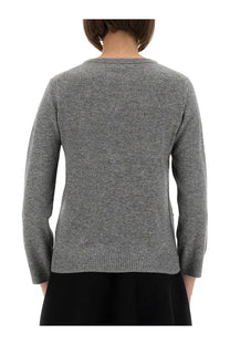 A soft heather gray knit sweater with classic crew neck and ribbed cuffs in ganni womens jacquard cashmere cardigan purple